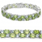 Preview: Bezauberndes Peridot/Blautopas-Armband Silber-Rhod.-23 Karat-72 Edelsteine